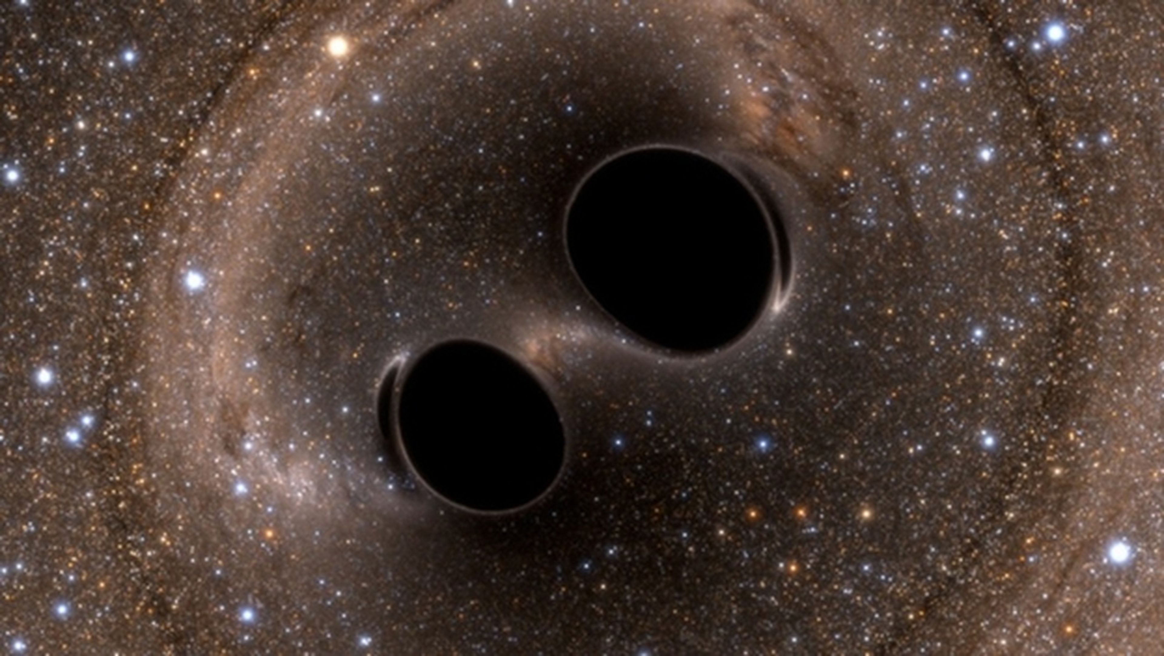 Descubren dos agujeros negros supermasivos orbitando entre sí