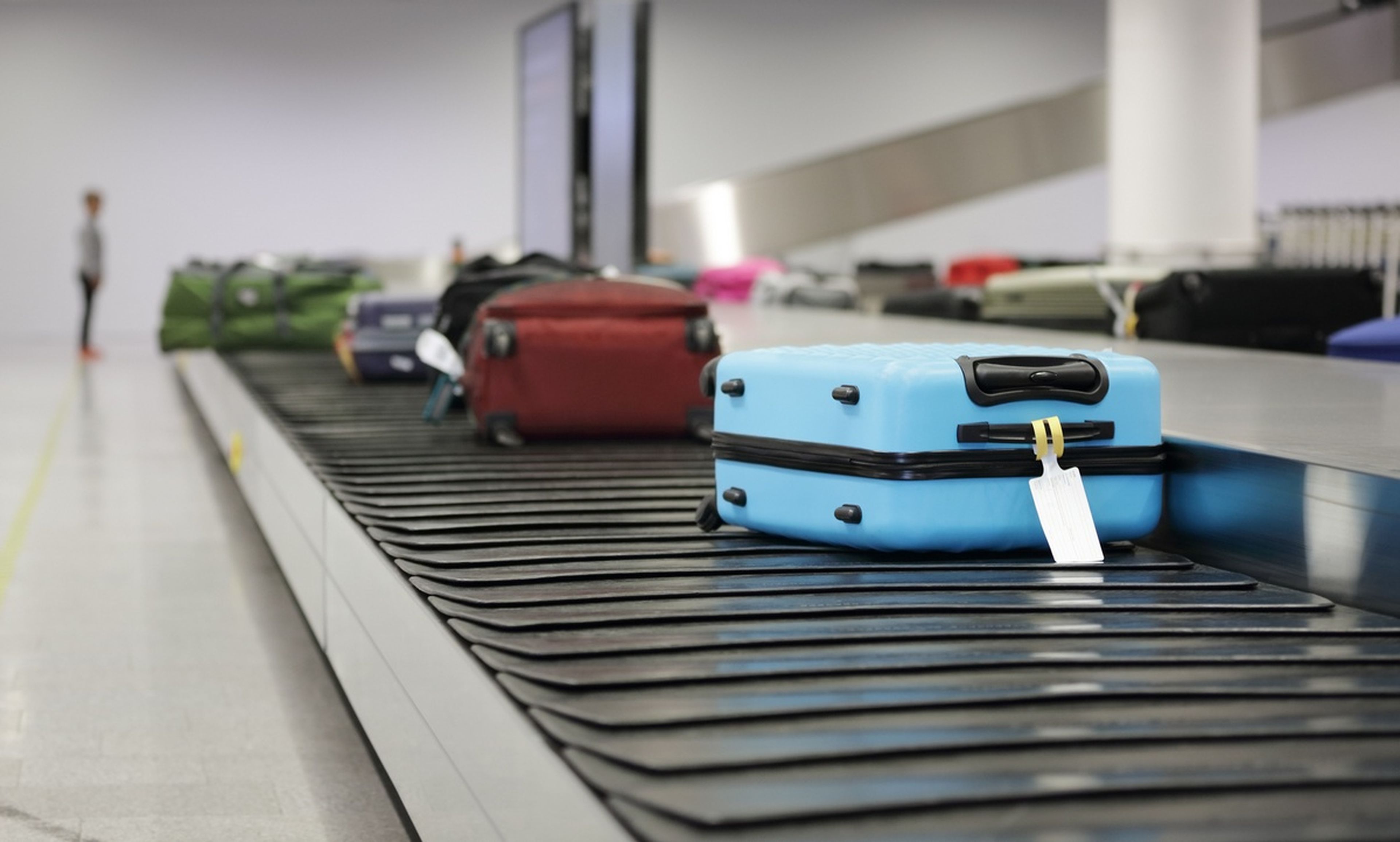 Trucos para que tu maleta sea la primera en la cinta de recogida del aeropuerto