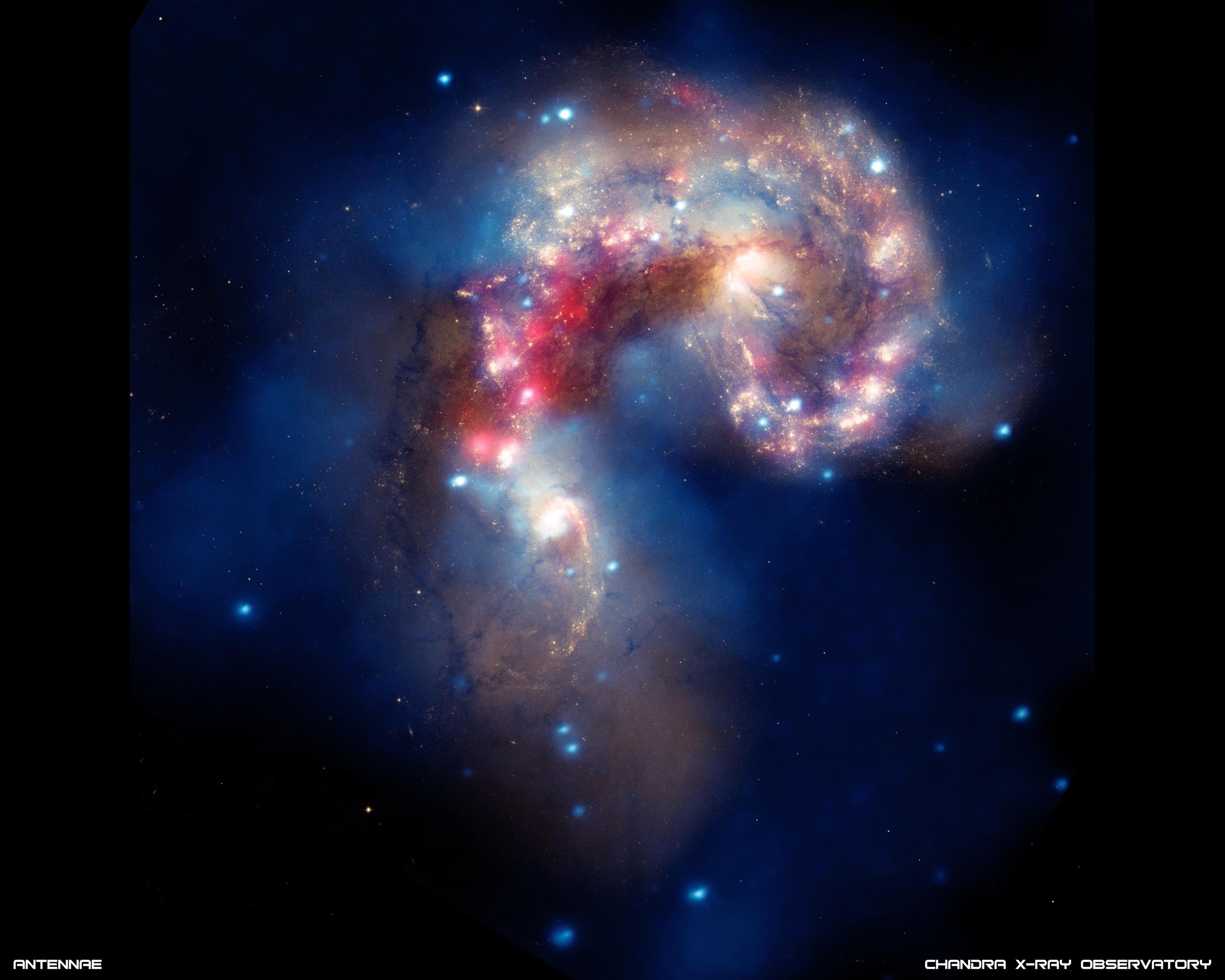 Colisión de galaxias observada por el telescopio Spitzer