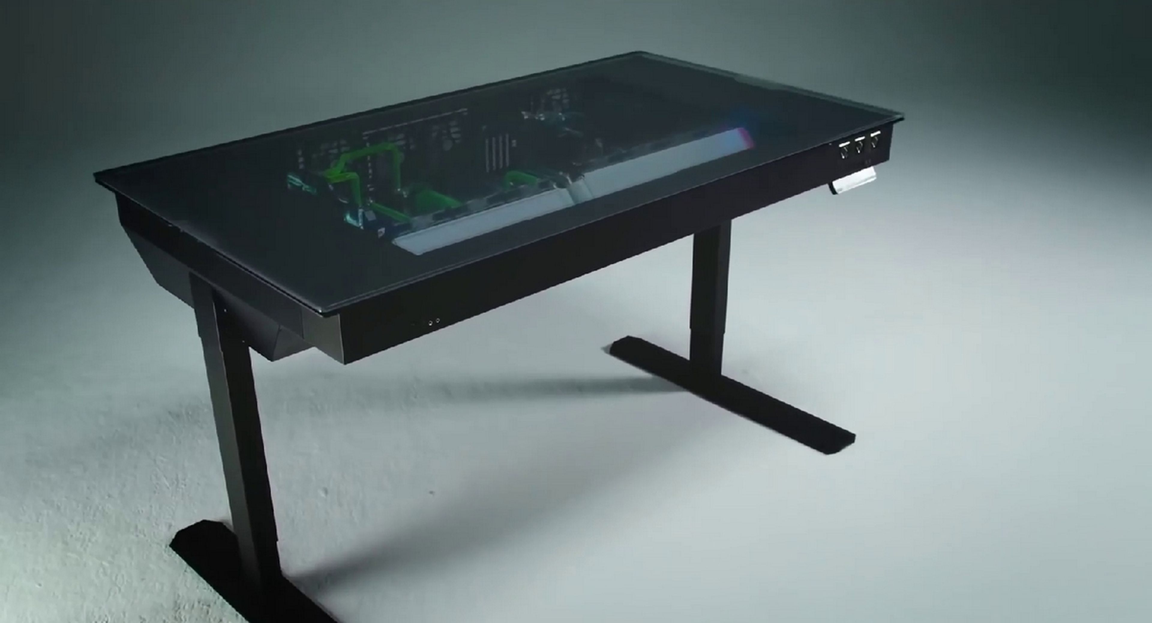 Esta mesa de trabajo esconde dos potentes PCs con refrigeración líquida en su interior