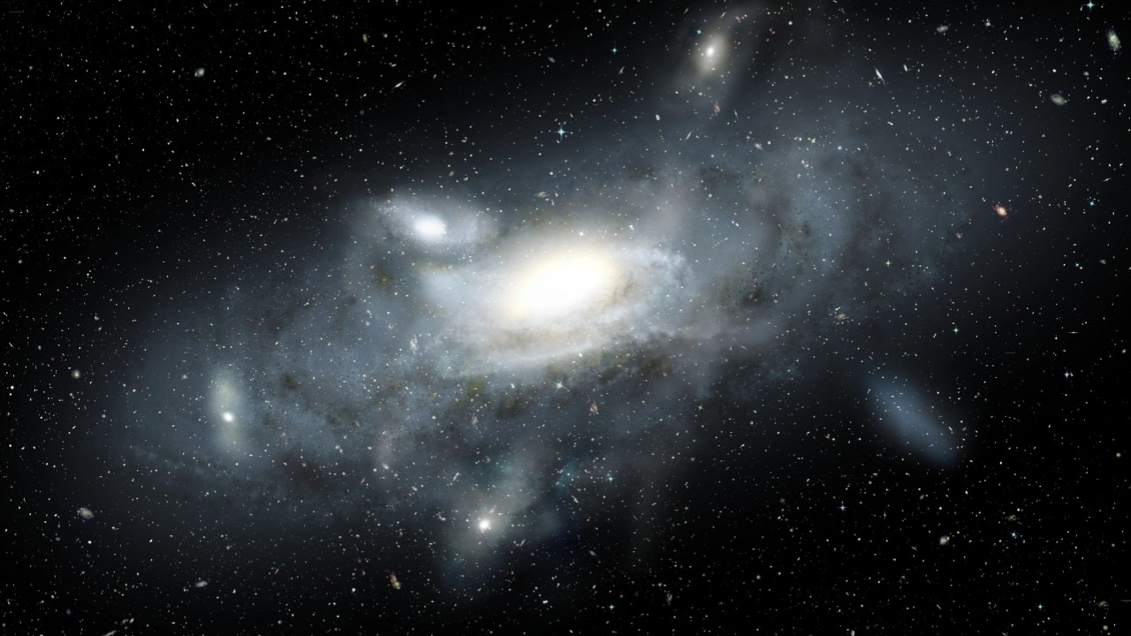 Imagen artística de la Vía Láctea en su juventud, rodeada de cúmulos globulares, James Josephides, Swinburne University