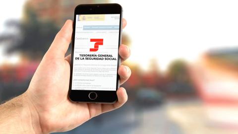 Logo de Hacienda y la Seguridad Social en un móvil Logo de Hacienda y la Seguridad Social en un móvil